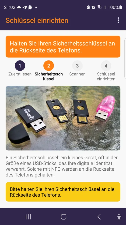 Einen Schlüssel einrichten: ihn an die Rückseite des Telefons halten.